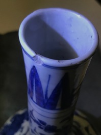 A Chinese blue and white bottle vase with birds in a landscape, Wanli