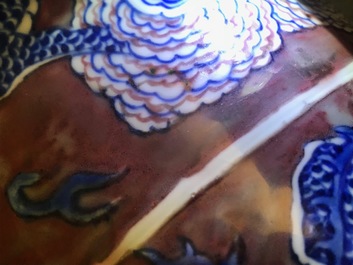 A rare Chinese blue, white and underglaze red rouleau vase, Kangxi