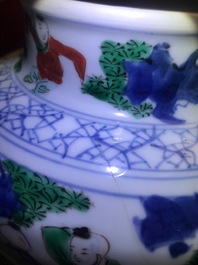 A Chinese wucai '100 boys' baluster vase, Transitional period