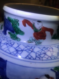 A Chinese wucai '100 boys' baluster vase, Transitional period
