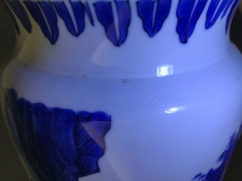 A fine Chinese blue and white sleeve vase with figural design all-round, Transitional period