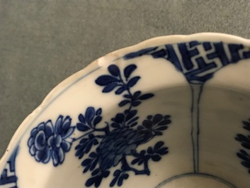 Six Chinese blue and white bowls on stands, Kangxi