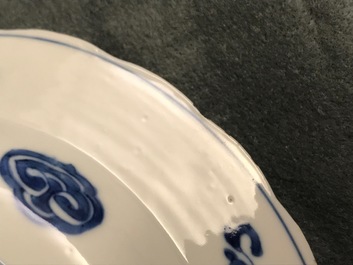 Six Chinese blue and white bowls on stands, Kangxi