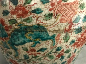 A Chinese polychrome Swatow jar with Buddhist lions among peony scrolls, Ming