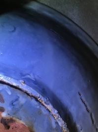 A Chinese Swatow celadon slip-decorated blue-ground dish, Ming