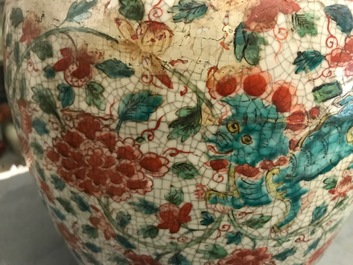A Chinese polychrome Swatow jar with Buddhist lions among peony scrolls, Ming