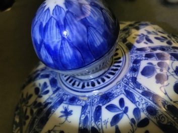 A large Chinese blue and white baluster jar and cover with floral panels, Kangxi