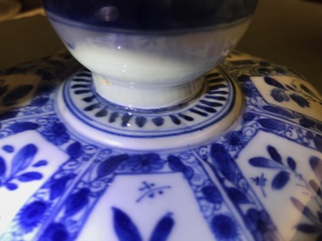 A large Chinese blue and white baluster jar and cover with floral panels, Kangxi