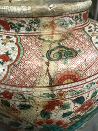 A Chinese polychrome Swatow jar with Buddhist lions among peony scrolls, Ming