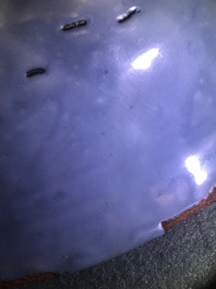 A Chinese Swatow celadon slip-decorated blue-ground dish, Ming