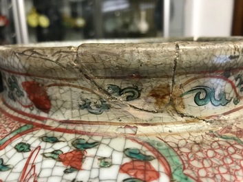 A Chinese polychrome Swatow jar with Buddhist lions among peony scrolls, Ming