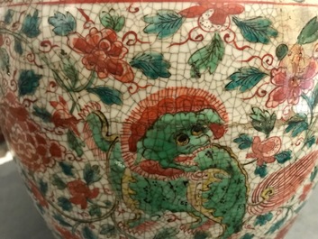 A Chinese polychrome Swatow jar with Buddhist lions among peony scrolls, Ming
