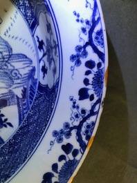 A pair of Chinese blue and white basins with figures in a garden, Yongzheng