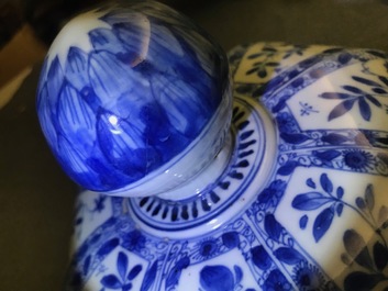 A large Chinese blue and white baluster jar and cover with floral panels, Kangxi