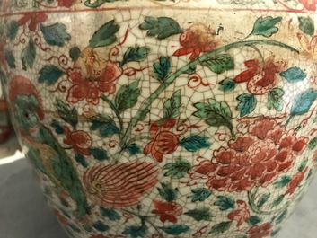 A Chinese polychrome Swatow jar with Buddhist lions among peony scrolls, Ming