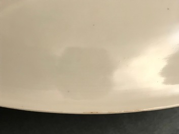 A Chinese famille rose dish with warriors on horseback, Yongzheng