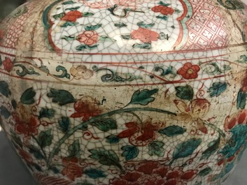 A Chinese polychrome Swatow jar with Buddhist lions among peony scrolls, Ming