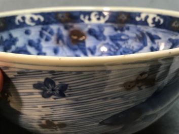 A Chinese blue and underglaze red bowl with carps and marine animals, Xuande mark, Kangxi