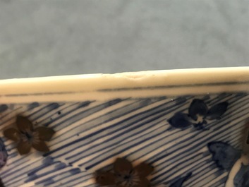 A Chinese blue and underglaze red bowl with carps and marine animals, Xuande mark, Kangxi