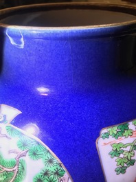 A pair of famille verte powder blue-ground vases and covers, Samson, Paris, 19th C.