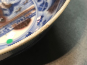 A Chinese blue and underglaze red bowl with carps and marine animals, Xuande mark, Kangxi