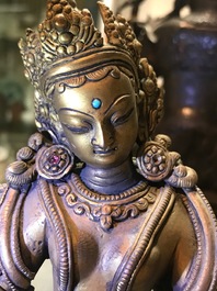 Une figure de Vasudhara en bronze dor&eacute; incrust&eacute;, Tibet ou N&eacute;pal, 18/19&egrave;me