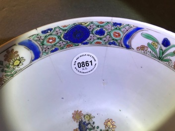 A Chinese famille verte plaque with playing boys and a landscape bowl, Kangxi
