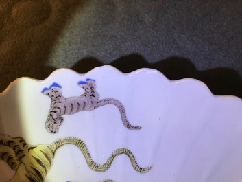 A pair of lobed Chinese famille verte Kakiemon-style 'tiger' plates, Kangxi