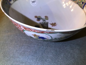 A Chinese famille verte plaque with playing boys and a landscape bowl, Kangxi