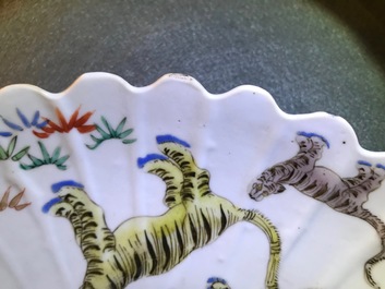 A pair of lobed Chinese famille verte Kakiemon-style 'tiger' plates, Kangxi