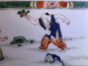 A Chinese famille verte plaque with playing boys and a landscape bowl, Kangxi