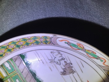 A Chinese famille verte 'Ladies and rabbits' plate, Kangxi