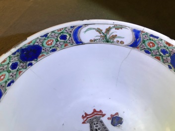 A Chinese famille verte plaque with playing boys and a landscape bowl, Kangxi