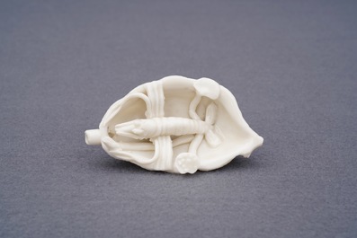 A Chinese Dehua blanc de Chine 'lobster on artemisia leaf' water dropper, Kangxi