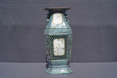 A Chinese reticulated robin's egg-ground qianjiang cai vase, 19th C.