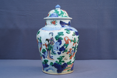 A Chinese wucai baluster vase and cover with playing boys, Transitional period