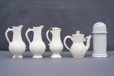 Four white Dutch Delft jugs, a pair of lobed plates and a large shaker, 17/18th C.