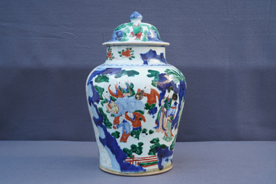 A Chinese wucai baluster vase and cover with playing boys, Transitional period