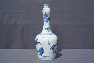 A Chinese blue and white bottle vase with inscription, Transitional period