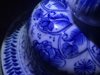 A Chinese blue and white covered vase with floral design, Kangxi