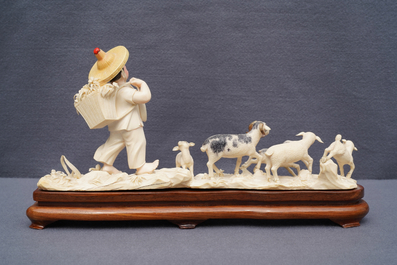 A polychrome Chinese ivory group with a shepherd, ca. 1940
