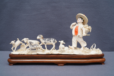 A polychrome Chinese ivory group with a shepherd, ca. 1940