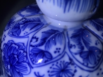 A Chinese blue and white covered vase with floral design, Kangxi