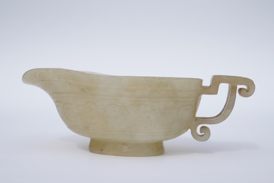 A Chinese pale yellow jade libation cup, 19th C.