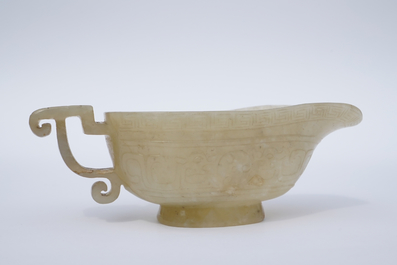 A Chinese pale yellow jade libation cup, 19th C.
