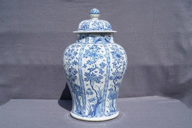 A large Chinese blue and white baluster jar and cover with floral panels, Kangxi