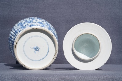 A Chinese blue and white covered vase with floral design, Kangxi