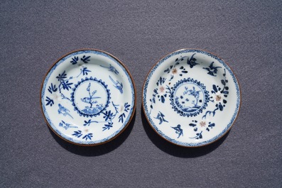 A pair of Chinese blue, white and underglaze red cups and saucers, Kangxi
