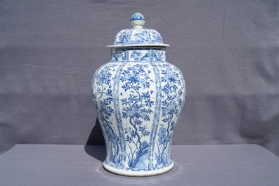 A large Chinese blue and white baluster jar and cover with floral panels, Kangxi