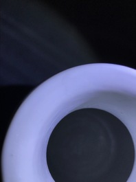 A Chinese blue and white rouleau vase with qilins, Kangxi